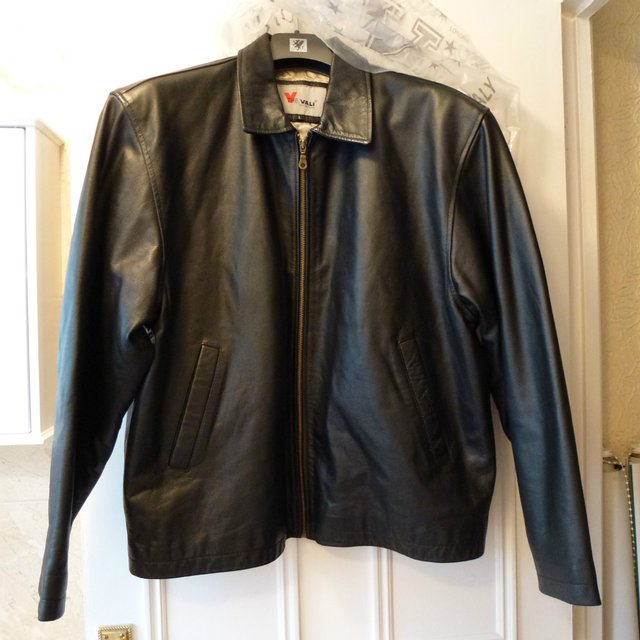Preview of the first image of brand new leather jacket.