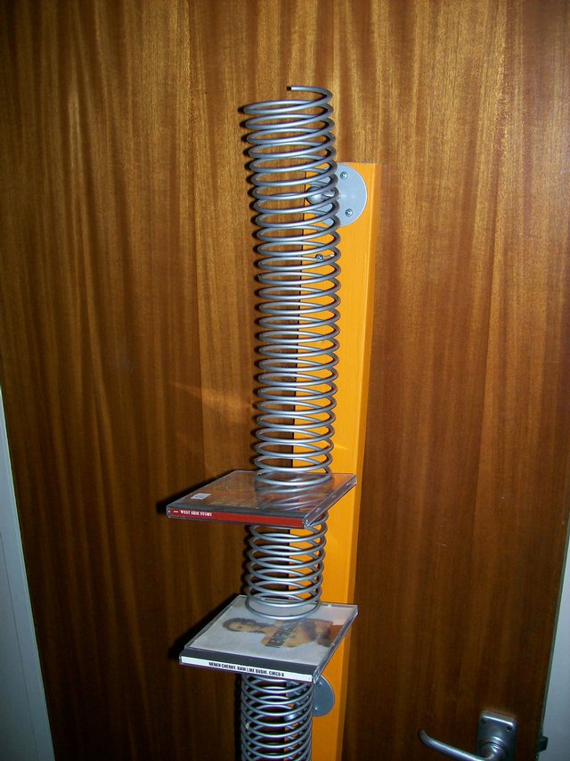 Preview of the first image of Spiral Spring CD holder - Used But As New.
