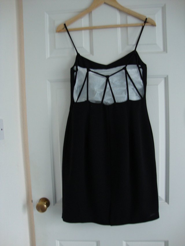 Preview of the first image of 'After Six' Black Cocktail dress size 12.