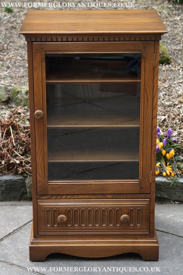Preview of the first image of ERCOL ELM GOLDEN DAWN HI-FI MUSIC DVD CD CABINET STANDTABLE.