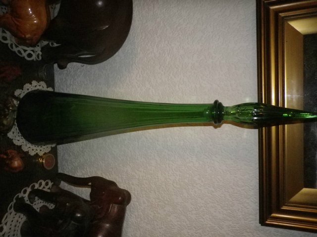 Preview of the first image of Green Glass Ornamental Vase with Finial top.