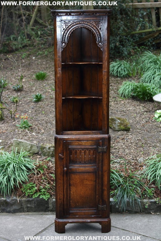 Preview of the first image of TITCHMARSH GOODWIN OAK DISPLAY CORNER CABINET BOOKCASE.