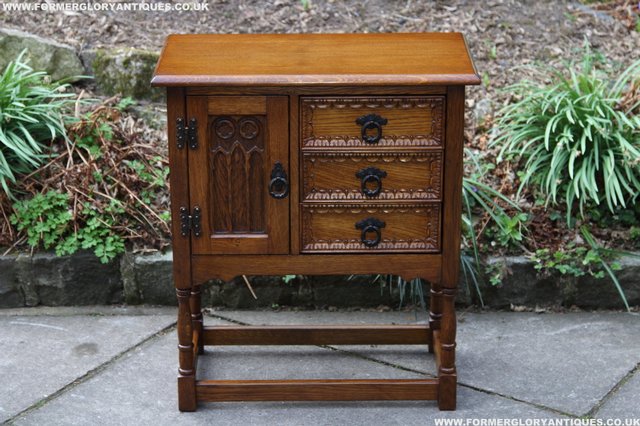Preview of the first image of OLDE COURT OLD CHARM OAK HALL CABINET CUPBOARD SIDEBOARD.