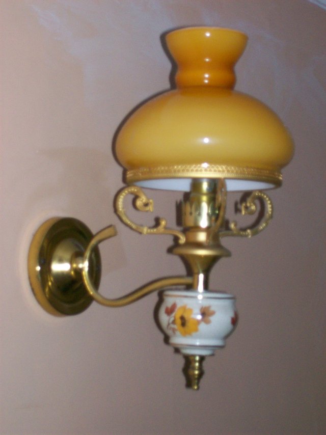 Preview of the first image of 2 No.Wall Lights with lantern type shade in yellowy orange..