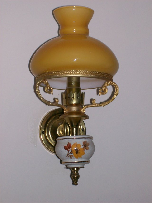 Image 2 of 2 No.Wall Lights with lantern type shade in yellowy orange.