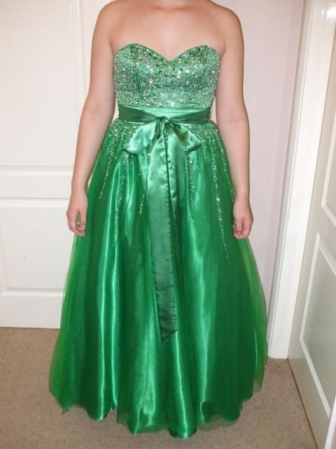 Preview of the first image of Green sequined prom dress size 10 to 14.