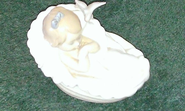 Preview of the first image of Lladro Baby in crib.