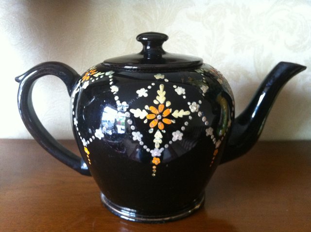 Preview of the first image of Antique Victorian terracotta hand paintedTea Pot.