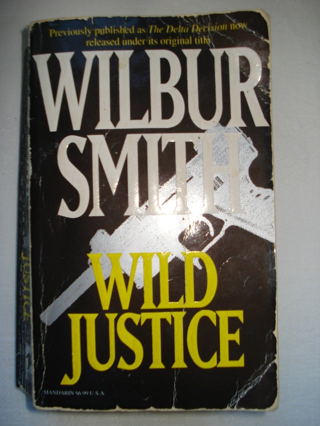 Preview of the first image of WILD JUSTICE by WILBUR SMITH Paperback.