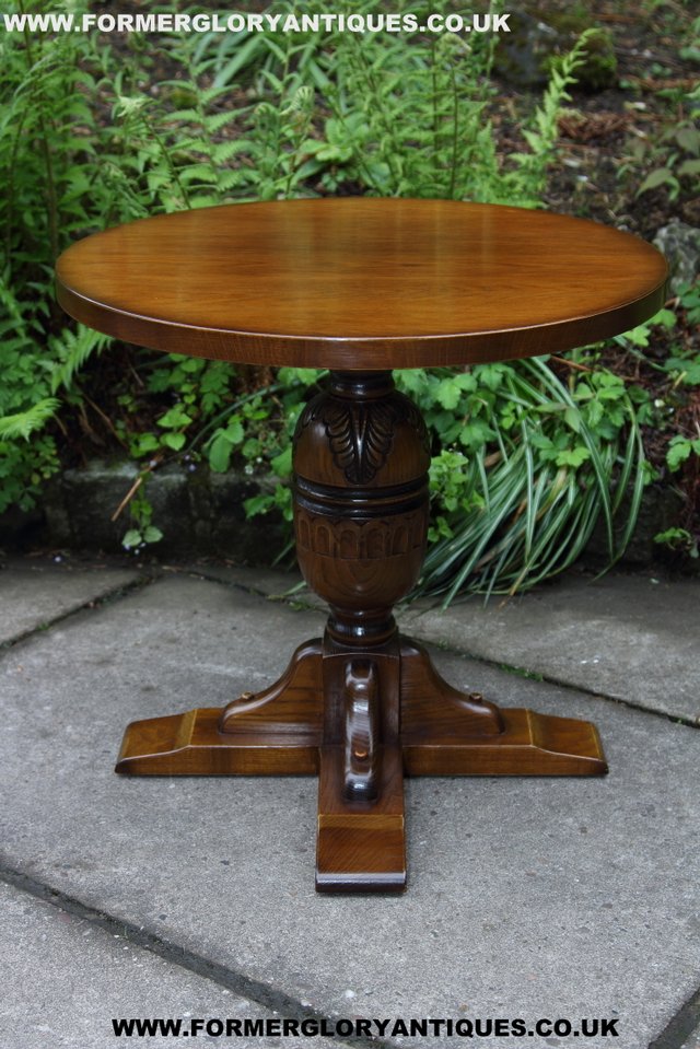 Preview of the first image of OLD CHARM NATHAN CARVED OAK COFFEE WINE OCCASIONAL TABLE.