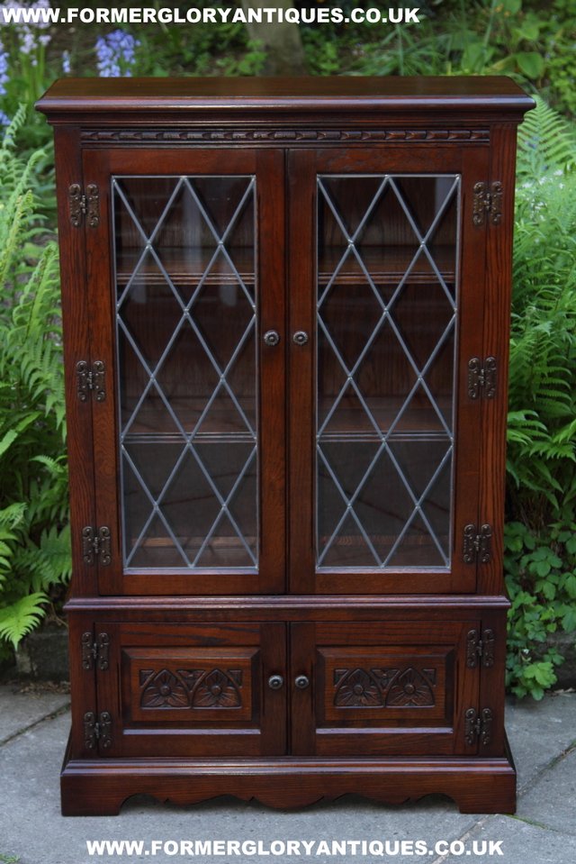 Preview of the first image of OLD CHARM TUDOR BROWN OAK BOOKCASE SHELVES DISPLAY CABINET.