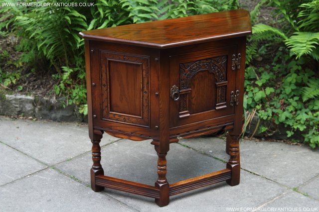 Preview of the first image of OLD CHARM OAK CABINET CANTED LAMP TABLE CUPBOARD SIDEBOARD.