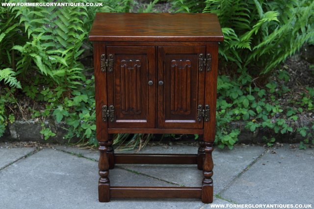 Preview of the first image of OLD CHARM TUDOR OAK BEDSIDE CABINET LAMP TABLE POT CUPBOARD.