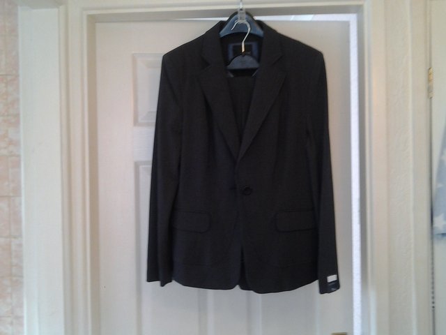 Preview of the first image of Suit - NEXT Trousers/Jacket Brand new.