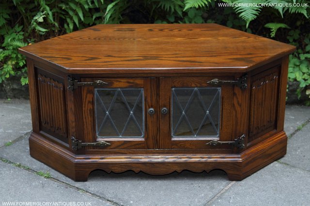 Preview of the first image of OLD CHARM LIGHT OAK CORNER TV STAND TABLE DVD CD CABINET.