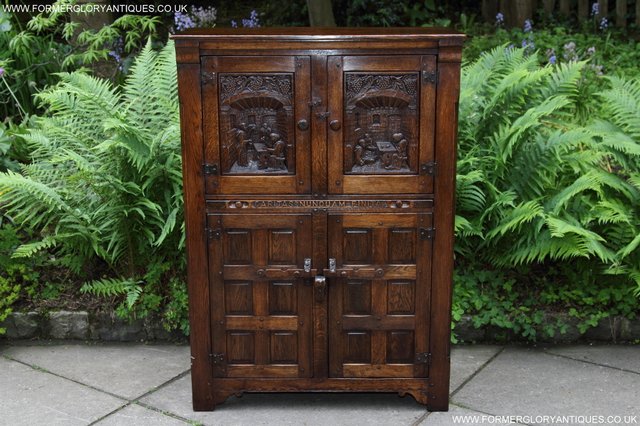 Preview of the first image of NIGEL RUPERT GRIFFITHS OAK WINE CUPBOARD DRINKS CABINET.