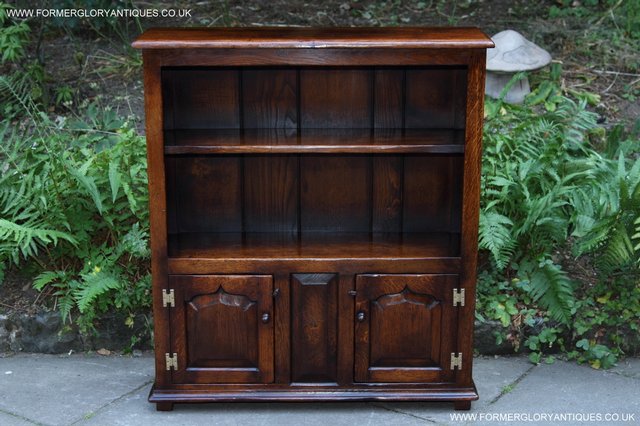 Preview of the first image of TITCHMARSH AND GOODWIN STYLE OAK BOOKCASE CABINET CUPBOARD.