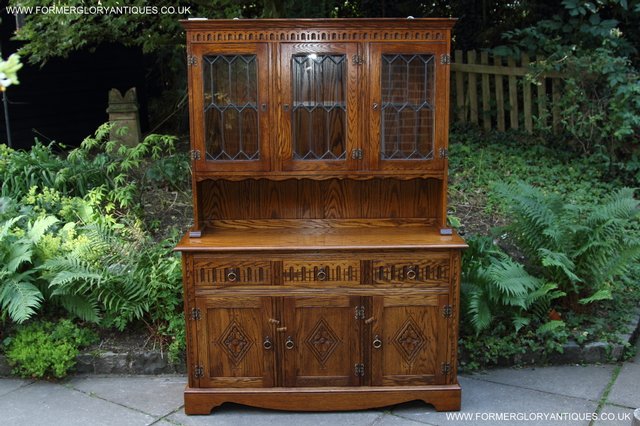 Preview of the first image of JAYCEE OAK DRESSER BASE SIDEBOARD BOOKCASE DISPLAY CABINET.