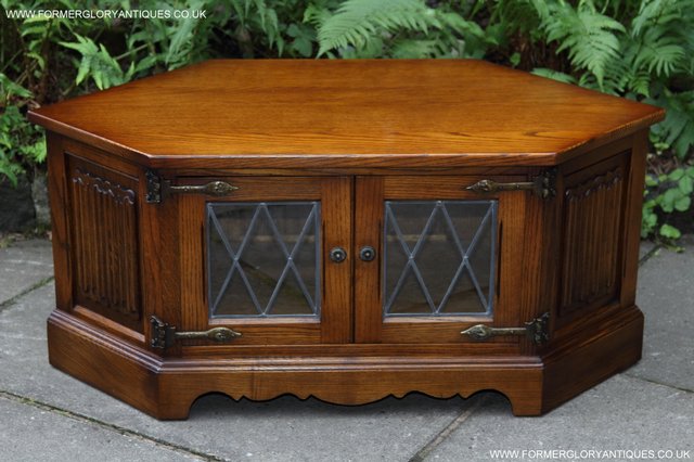 Preview of the first image of OLD CHARM LIGHT OAK CORNER T V STAND TABLE DVD CD CABINET.