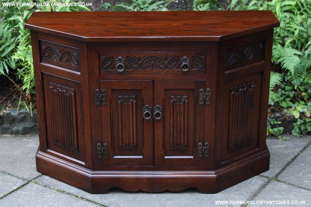 Preview of the first image of OLD CHARM TUDOR BROWN DRESSER BASE CANTED CUPBOARD SIDEBOARD.