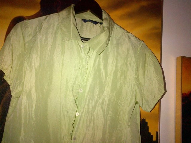 Preview of the first image of Boden silk  green shirt top blouse  size 10 with ruffles.