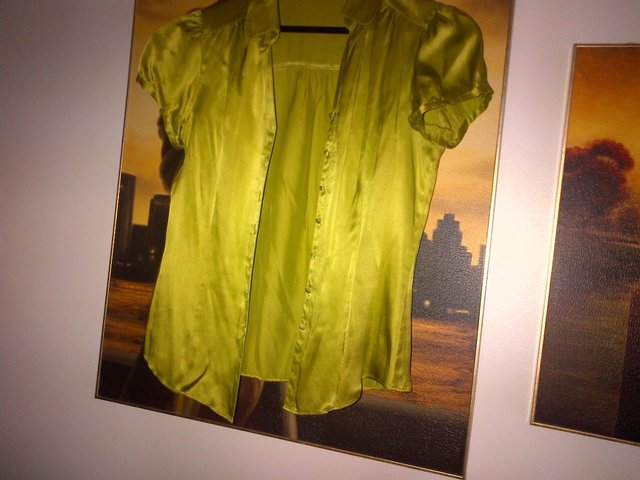 Preview of the first image of Star by Julien Macdonald silk green shirt blouse size 10.