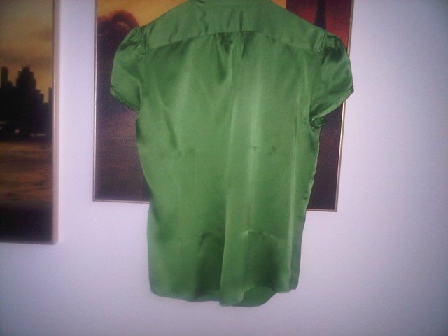 Preview of the first image of Designer Zara green silk blouse top UK size M.