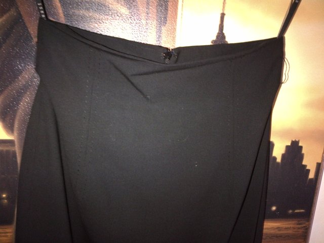 Preview of the first image of Coast black pencil skirt UK size 8 lined 96% wool.