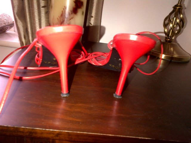 Preview of the first image of Bankiza red strappy sandals  leather  size 34.