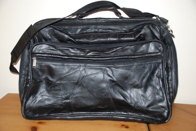 Preview of the first image of Black Leather Carry on Board Case.