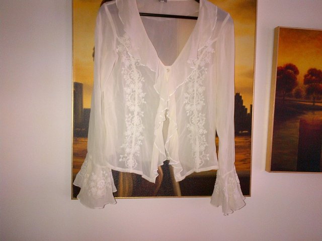 Preview of the first image of Kaliko silk white cream top blouse with embroideries Size 10.