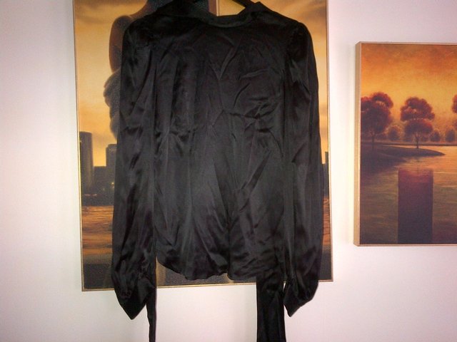 Preview of the first image of French Connection silk black top blouse  Size 10.
