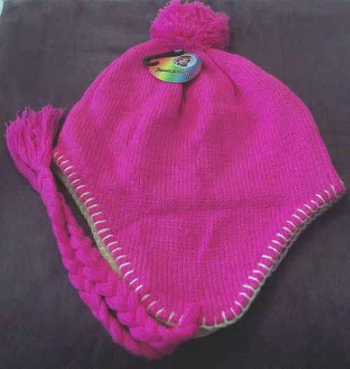 Preview of the first image of BNWT LADIES BRIGHT PINK PERUVIAN KNITTED HAT.