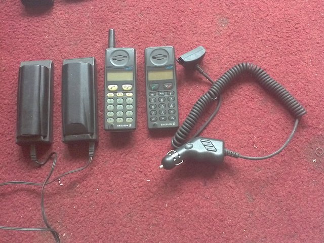 Preview of the first image of Classic Erissson mobile phone and charger.
