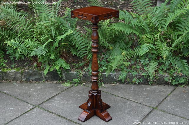 Preview of the first image of OLD CHARM TUDOR BROWN CARVED OAK PLANT STAND COFFEE TABLE.