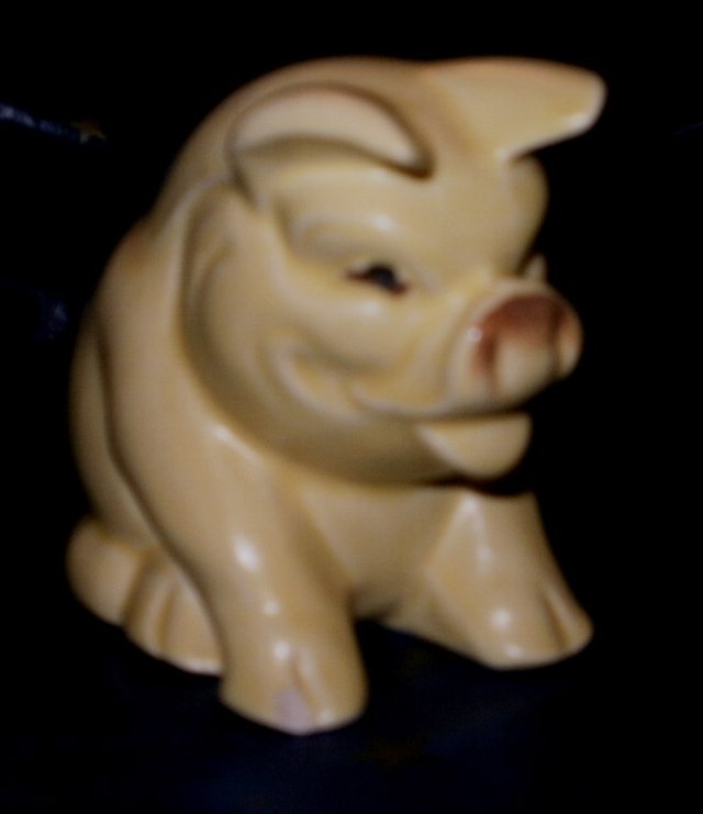 Preview of the first image of Vintage sitting pig  -pale lemon yellow.