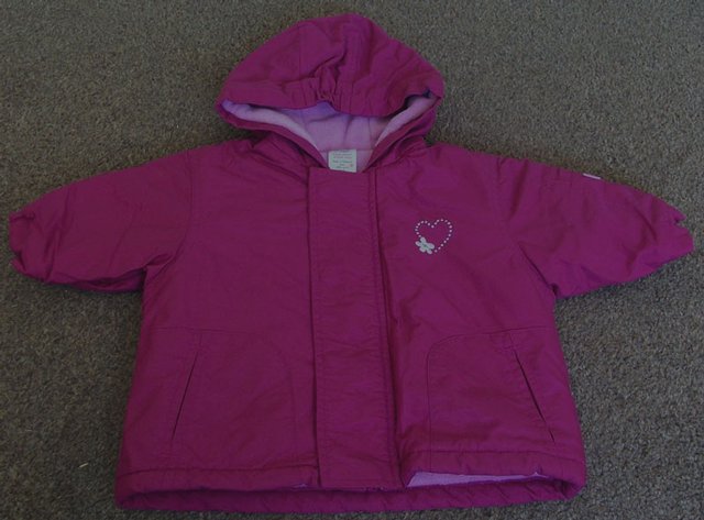 Preview of the first image of BEAUTIFUL GIRLS CERISE PINK HOODED JACKET 3/6 MONTHS.