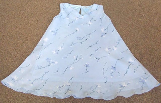 Preview of the first image of BEAUTIFUL GIRLS SOFT BLUE SUMMER DRESS AGE 4 YRS.