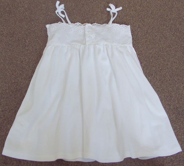 Preview of the first image of BEAUTIFUL WHITE BROIDERIE ANGLAIS DRESS BY BABY GAP.
