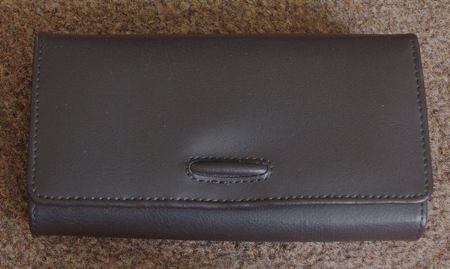 Preview of the first image of BNWOT LADIES BROWN PURSE BY BHS - NEW NEVER BEEN USED.