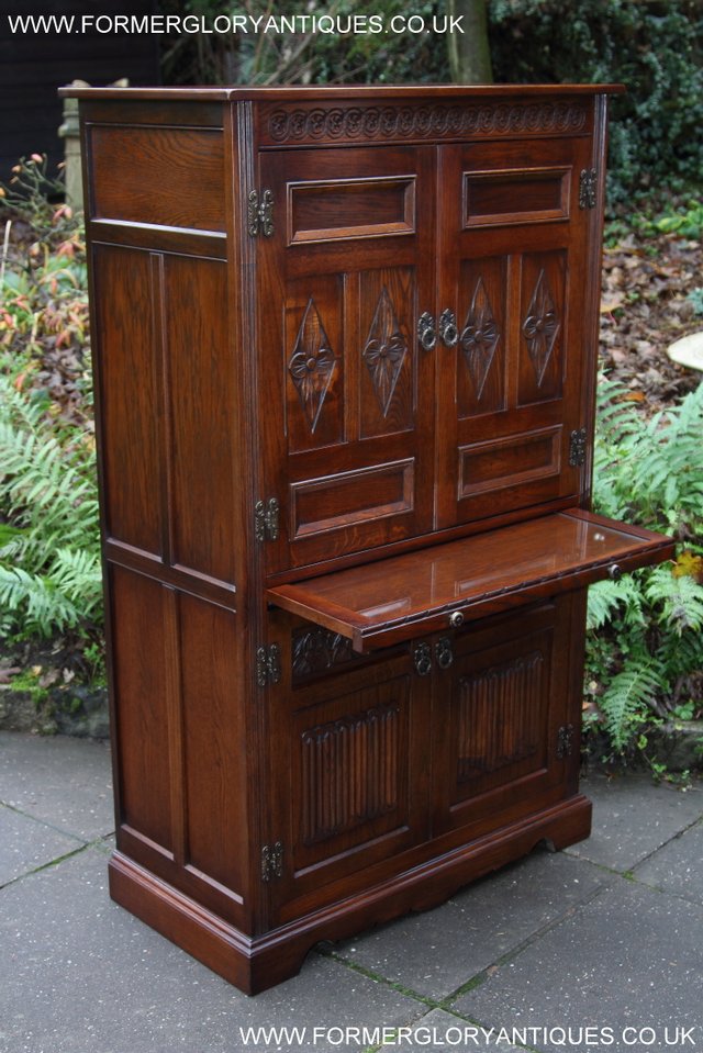 Image 34 of OLD CHARM TUDOR BROWN DRINKS COCKTAIL WINE DISPLAY CABINET