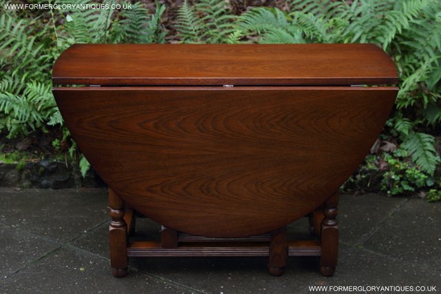 Preview of the first image of OLD CHARM TUDOR OAK EXTENDING KITCHEN DINING GATLEG TABLE.