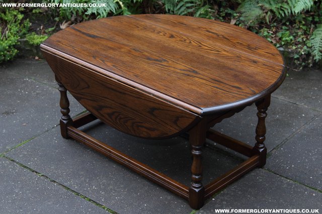 Preview of the first image of OLD CHARM LIGHT OAK DROP LEAF LAMP COFFEE TEA SIDE TABLE.