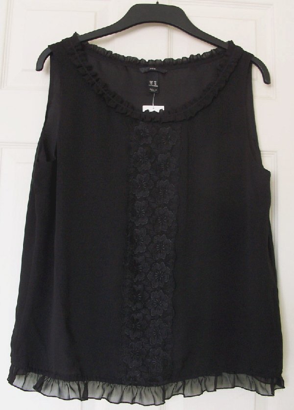 Preview of the first image of BNWT GORGEOUS LADIES BLACK EVENING TOP BY H&M  B10.