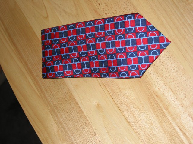 Preview of the first image of Authentic New Gucci Tie from Harrods.