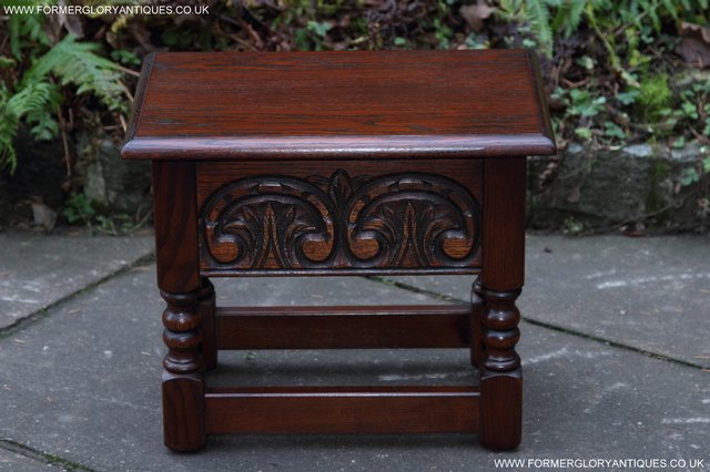 Preview of the first image of OLD CHARM TUDOR OAK SLIPPER SEWING BOX COFFEE TABLE.
