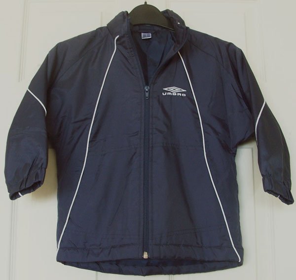 Preview of the first image of BOYS NAVY JACKET BY UMBRO - AGE 3/4 YRS.