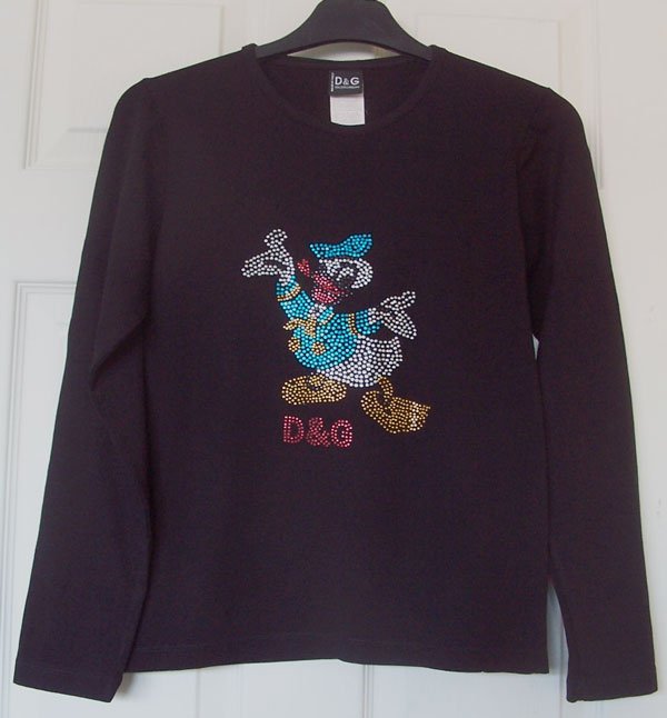 Preview of the first image of LADIES BLACK TOP WITH DONALD DUCK MOTIF - SZ L B5.