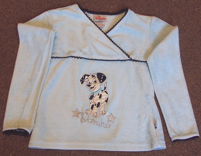 Preview of the first image of GIRLS BEAUTIFUL DISNEY PALE BLUE VELOUR TOP - 7/8 YRS.