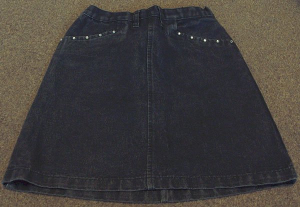 Preview of the first image of GIRLS BLACK DENIM SKIRT WITH DIAMANTE TRIM - AGE 6/7 YRS.